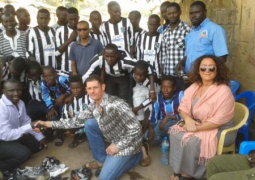 buster and parents pose with blue stars fc