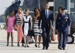 u.s. president barack obama  first lady michelle obama and their daughters sasha l and malia 2nd r walk to air force one at andrews air force base near washington  june 26  2013
