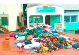 yankuba colley parlour with garbage and waste 1