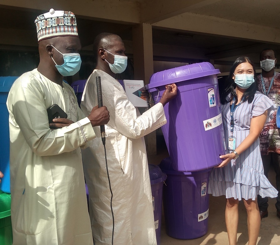IOM donates 350 plastic buckets to MoBSE