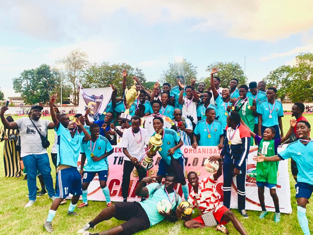 Cambel Town FC clasp late M.O. Serrekunda West Super Cup trophy