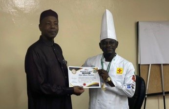 African Signature Cuisine winners present award to Tourism minister