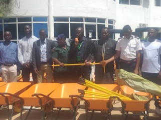 Security services receive D200K worth of environmental cleansing materials