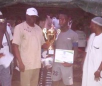 Deago FC lift Tripoli Family Association fitness trophy