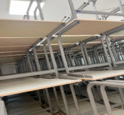 MRC Holland donates 427 desks to UTG