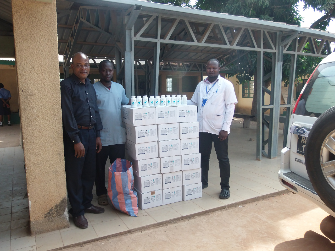Foundation presents 18 cartons of multi-vitamins to Banjulinding H/C