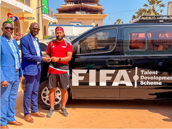 GFF hands over vehicle to FIFA Talent Development Coach Spencer