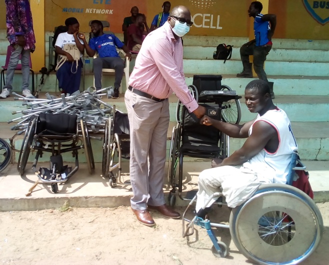 GNPC present wheelchairs to members