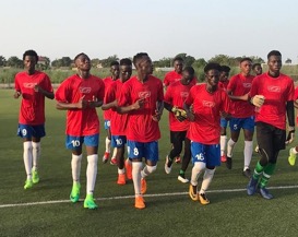 Gambia U-20 team stretch muscles for FIFA U-20 World Cup