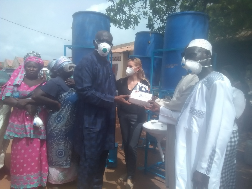 German Embassy, GAMWORKS hand over Covid-19 equipment to Burfut community