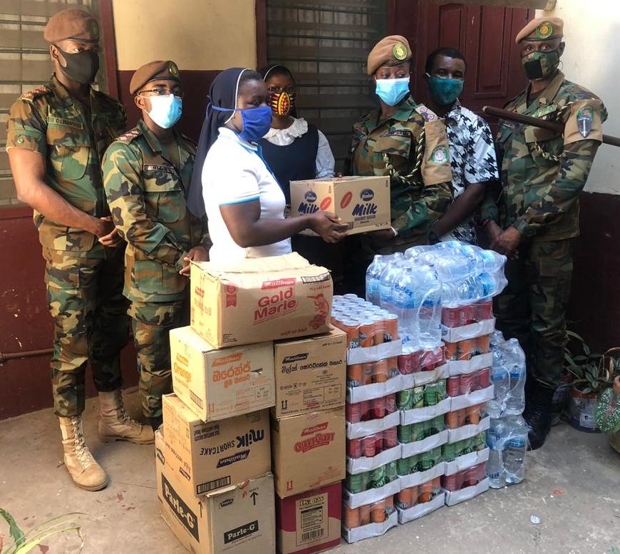 Ghanaian Troopsdonate Christmasgifts to Catholic Diocese of Banjul children