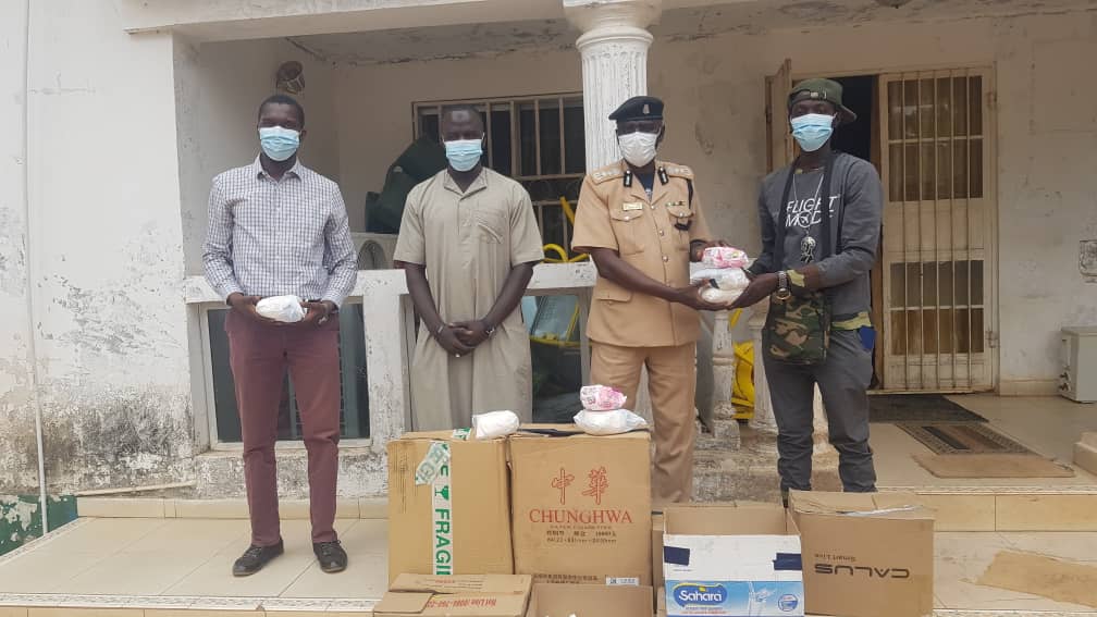 Team Gom Sa Bopa presents gifts to Mile 2 Prison
