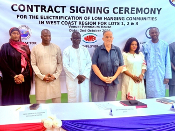 Gov’t targets universal electricity by 2028, signs contracts for 10 WCR communities