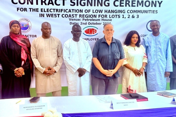 Gov’t targets universal electricity by 2028, signs contracts for 10 WCR communities