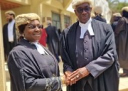 Justice Ademine Coker Justice Hassan B Jallow