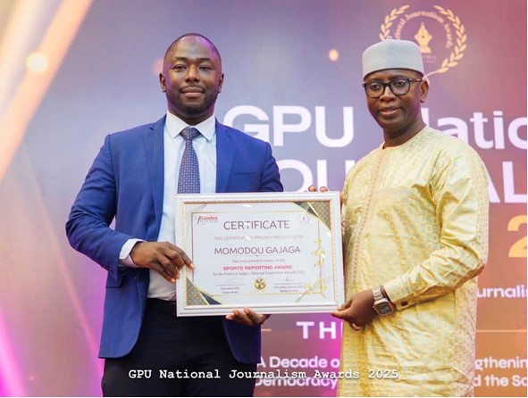 Brikama Utd applaud Momodou Gajaga after winning GPU Sports Reporting Award