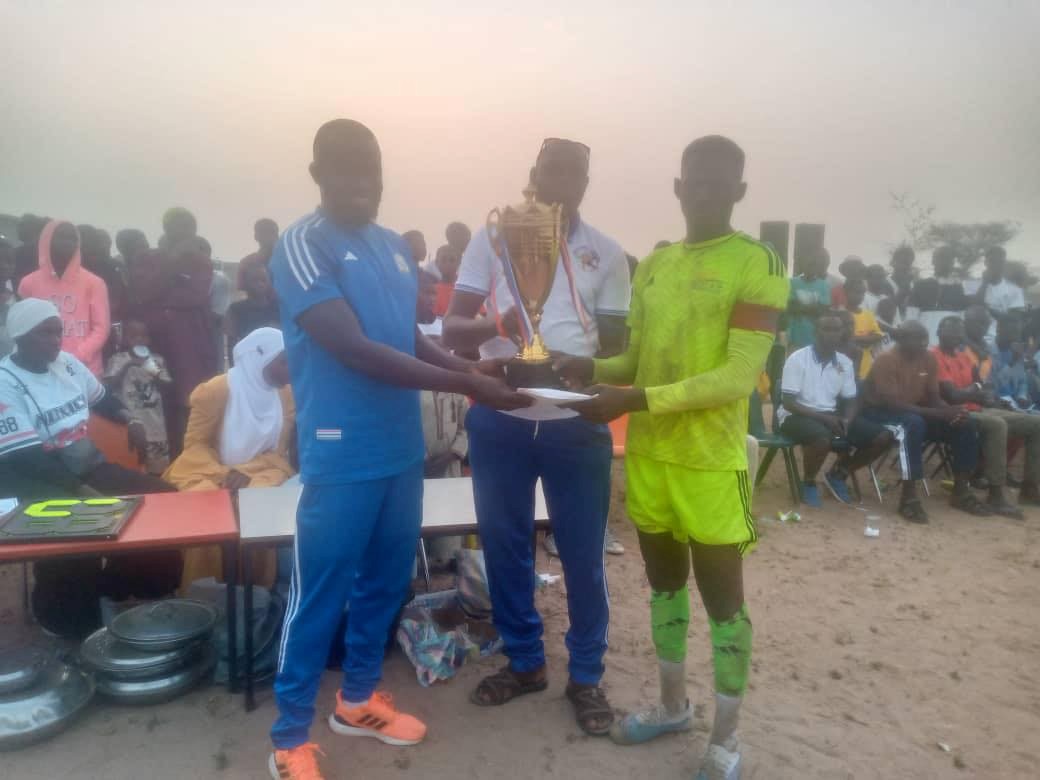 Peakoto FC clasp Sambuyang tournament trophy