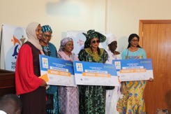 Q-Group Foundation presents D600,000 cheques to 3 entrepreneurs