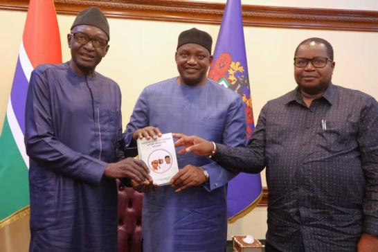 Gambian author & diplomat Rtd. Col. Sam  Sarr presents latest book to Barrow