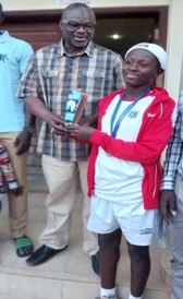 Scan-Aid presents Pan African U-15 trophy to GFF prexy