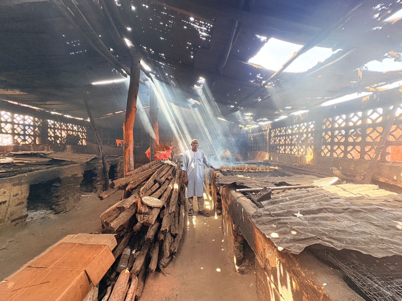 Tanji fish smokers struggle as supply drops, costs rise