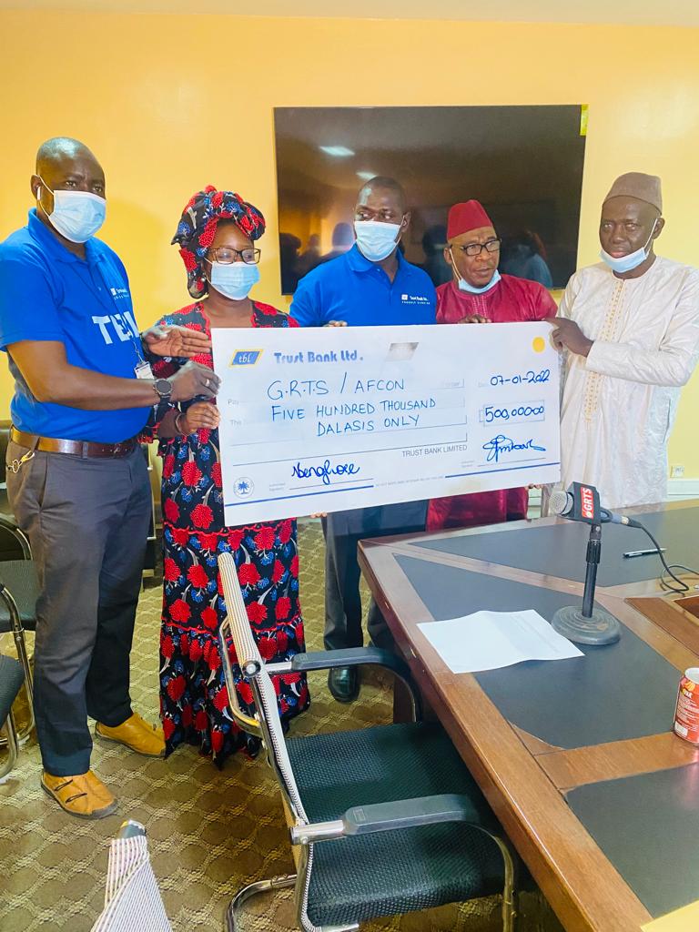Trust Bank donates D500,000 to GRTS for AFCON coverage