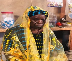 Woman opens bank account, shop from Nafa Program