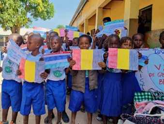 Belgium Friends present 148 bags of Rice to 183 sponsored pupils
