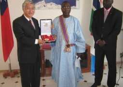 ambassador juwara receiving his award