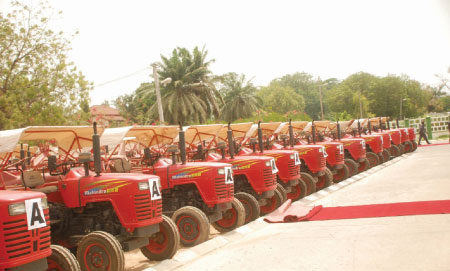 President Jammeh presents tractors to chiefs, others