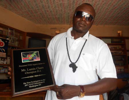 DJ Lamin Cham receives international award