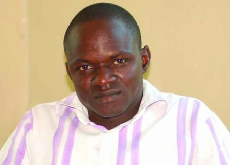 Former Observer Sports Editor charged, detained