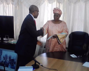 Bank PHB presents D200, 000, exercise books to education