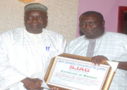 baks touray receiving award from pap saine