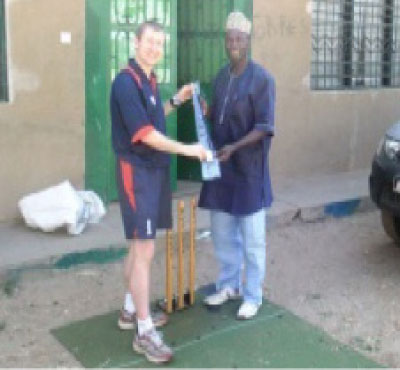 Cricket Association President Johnny Gomez receives award