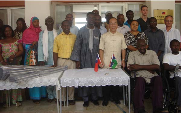Ambassador Chen presents wheelchairs, crutches to community of disabled