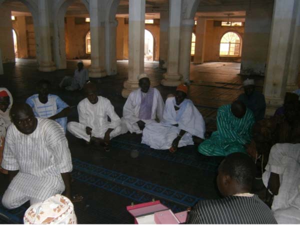 Members of association of physically disabled recite Quran for sponsors
