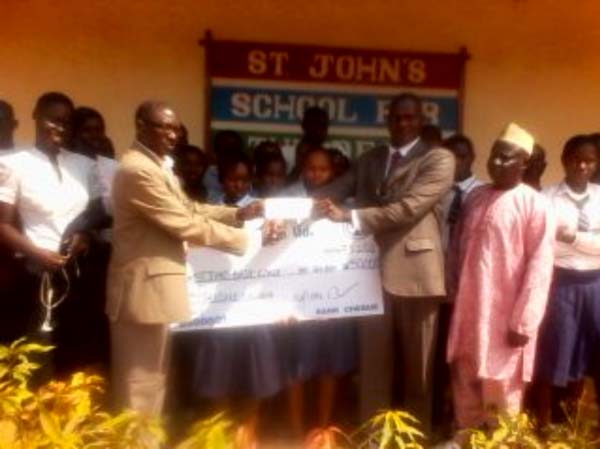 Trust Bank donates D50,000 worth of fuel coupons to St. John’s School