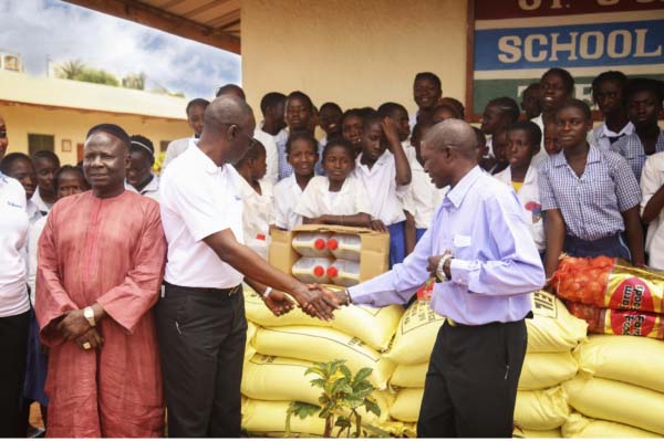 FiBank presents food items to St. John’s School for the Deaf