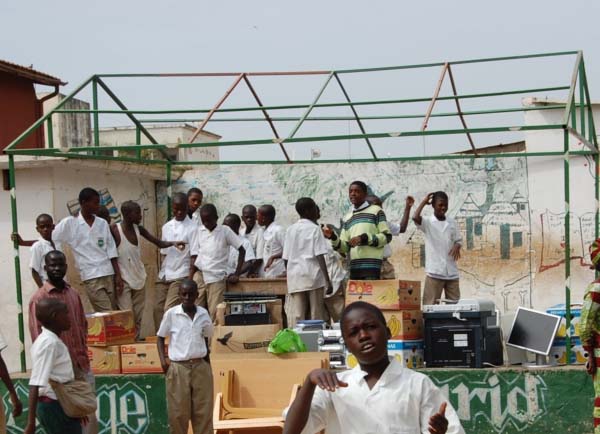 Action gambia donates computers to MPS, others