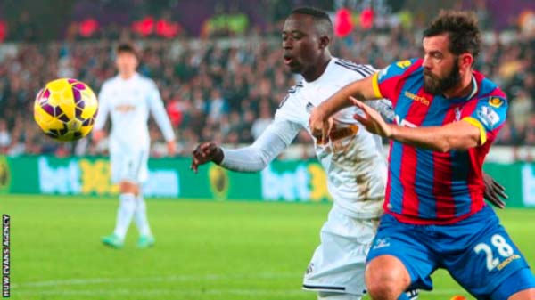 Gambian forward Modou Barrow signs long-term Swansea deal