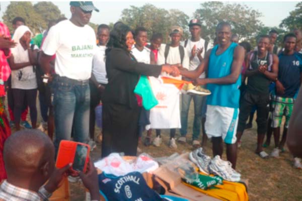 Gambia volunteers donate sports materials to GAA, BBA