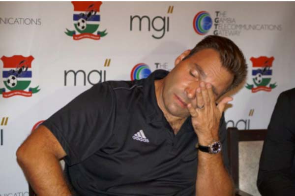 GFF parts with coach Raoul Savoy