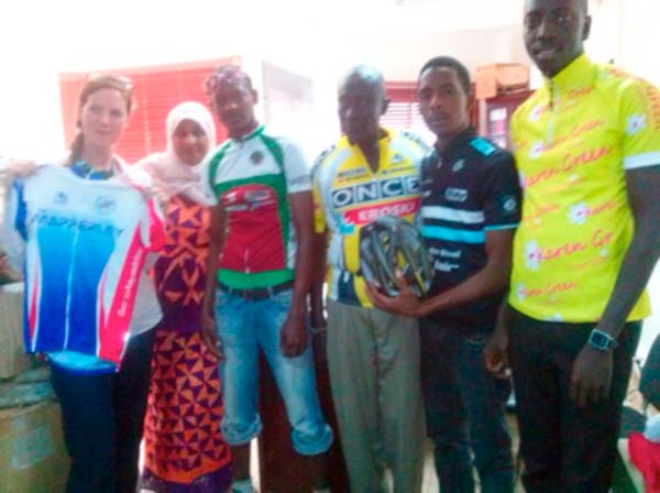 UK-based cyclist presents cycling materials to Gambia Cycling Association
