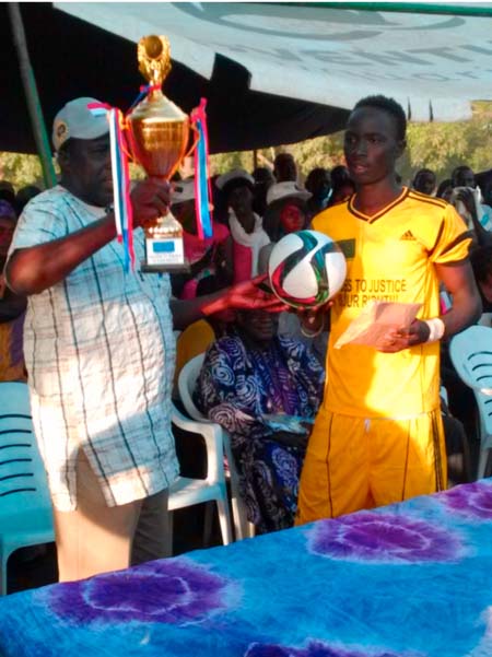 Kwinella Town team lift “Access to Justice” tourney cup