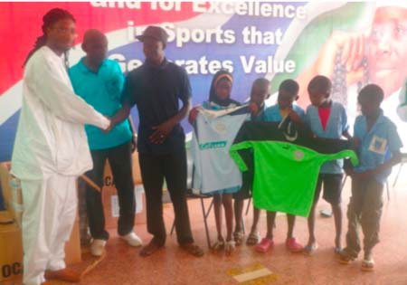 Kassumai Group donates football materials to schools, others