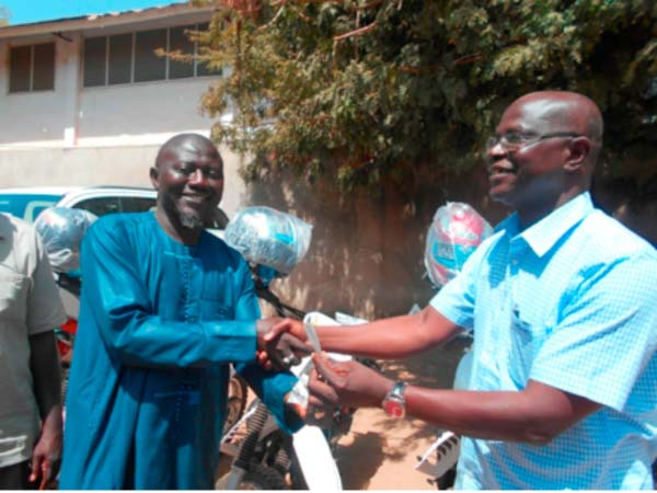 AVCDP gives vehicles, bikes to implementing partners