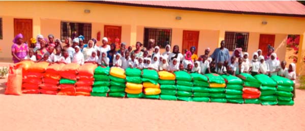 Helping charity distributes rice to communities in NBR