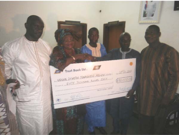 Trust Bank donates D50,000 to NDMA