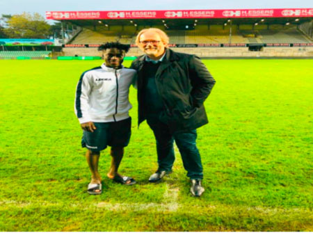 Scorpions Coach Tom watches Abdoulie Sanyang as SK Lommel defeat  Lokeren